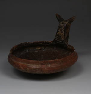 Villanovan / Early Etruscan kyathos: ITEM: Kyathos MATERIAL: Pottery CULTURE: Villanovan / Early Etruscan PERIOD: 8th - 7th Century A.D DIMENSIONS: 75 mm x 103 mm x 117 mm CONDITION: Good condition, repaired PROVENANCE: Ex Austrian