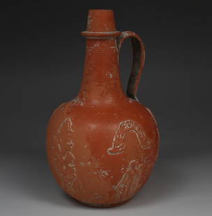 Roman bottle: ITEM: Bottle MATERIAL: Terra Sigillata CULTURE: Roman, North Africa PERIOD: 3rd - 4th Century A.D DIMENSIONS: 180 mm x 100 mm CONDITION: Good condition, handle repaired PROVENANCE: Ex French private