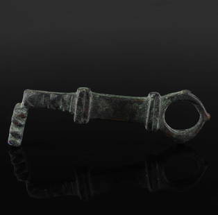 Roman key: ITEM: Key MATERIAL: Bronze CULTURE: Roman PERIOD: 1st - 3rd Century A.D DIMENSIONS: 82 mm x 30 mm CONDITION: Good condition PROVENANCE: Ex German private collection, Dr. K.B., Munich, since the 1970s