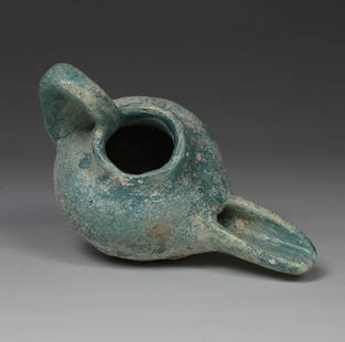Islamic oil lamp: ITEM: Oil lamp MATERIAL: Pottery CULTURE: Islamic PERIOD: 11th - 13th Century A.D DIMENSIONS: 60 mm x 56 mm x 103 mm CONDITION: Good condition PROVENANCE: Ex French private collection, acquired