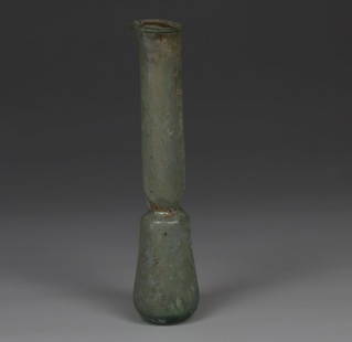 Roman flask: ITEM: Flask MATERIAL: Glass CULTURE: Roman PERIOD: 1st - 3rd Century A.D DIMENSIONS: 86 mm x 17 mm CONDITION: Good condition PROVENANCE: Ex Dutch private collection, acquired between 1980 - 1990 