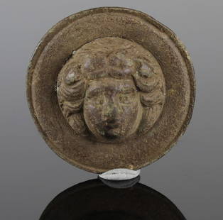 Roman roundel with a female head: ITEM: Roundel with a female head MATERIAL: Bronze CULTURE: Roman PERIOD: 1st - 3rd Century A.D DIMENSIONS: 36 mm diameter CONDITION: Good condition PROVENANCE: Ex English private collection, acquired