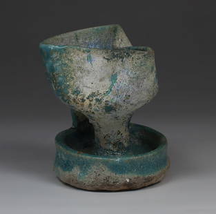 Islamic oil lamp, Type Kubiak L: ITEM: Oil lamp, Type Kubiak L MATERIAL: Pottery CULTURE: Islamic PERIOD: 12th - 13th Century A.D DIMENSIONS: 75 mm x 65 mm diameter CONDITION: Good condition PROVENANCE: Ex French private collection,