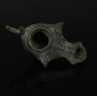Roman oil lamp: ITEM: Oil lamp MATERIAL: Bronze CULTURE: Roman PERIOD: 1st - 2nd Century A.D DIMENSIONS: 18 mm x 34 mm x 55 mm CONDITION: Good condition PROVENANCE: Ex Dutch private collection, acquired between 1970