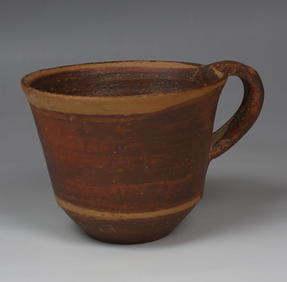 Roman cup: ITEM: Cup MATERIAL: Pottery CULTURE: Roman PERIOD: 1st Century B.C - 1st Century A.D DIMENSIONS: 74 mm x 115 mm CONDITION: Good condition PROVENANCE: Ex German private collection, W.F