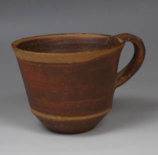 Roman cup: ITEM: Cup MATERIAL: Pottery CULTURE: Roman PERIOD: 1st Century B.C - 1st Century A.D DIMENSIONS: 74 mm x 115 mm CONDITION: Good condition PROVENANCE: Ex German private collection, W.F., acquired