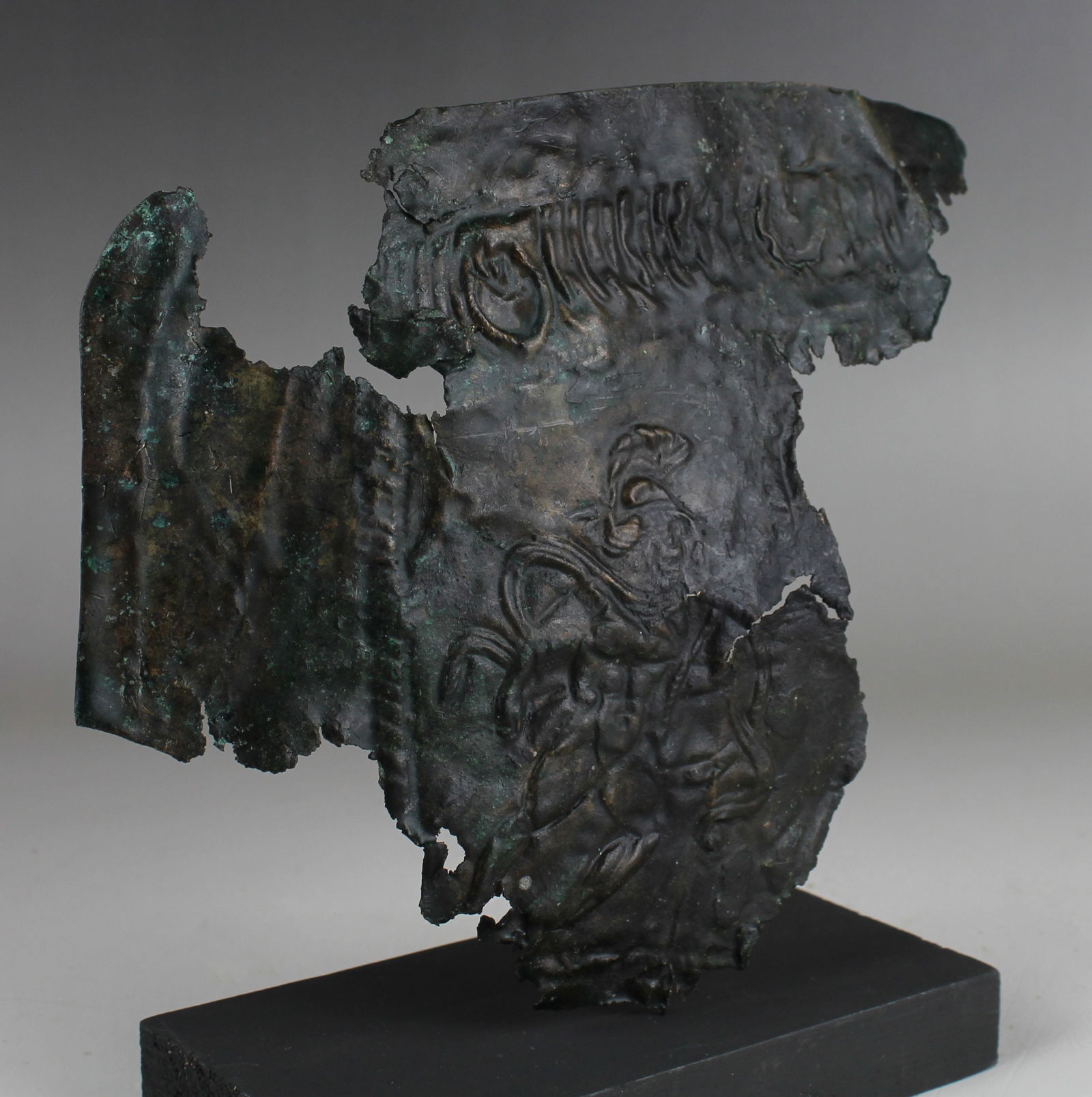 Roman military mask helmet section depicting Mars (1 of 5)