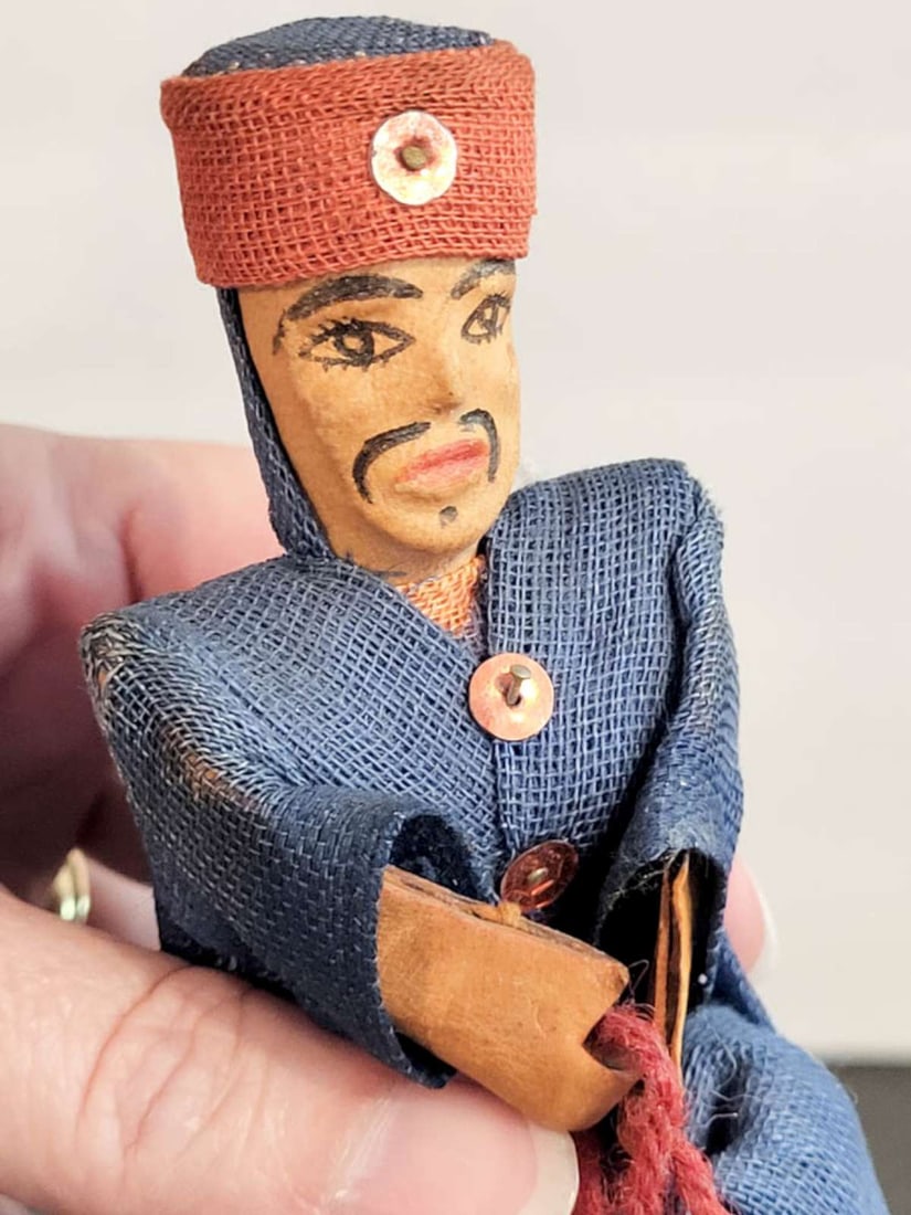 vintage doll on leather camel (1 of 6)