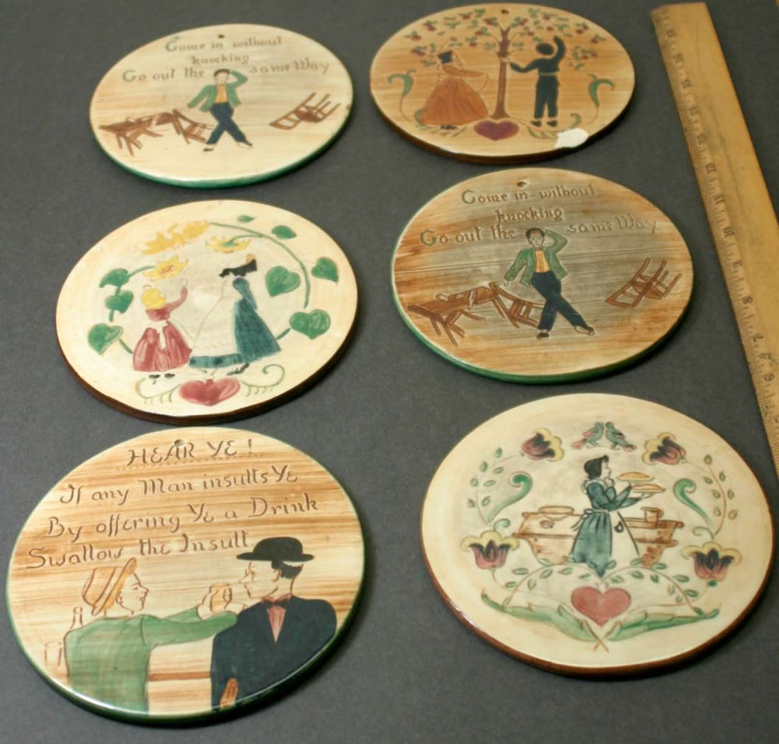 vintage redware set of wall hung plaques: lot of 6 vintage trivets or coasters with polychrome glossy glaze designs of Amish farm life, depicting people (men, women and children) and sayings, marked on the back as shown Penn