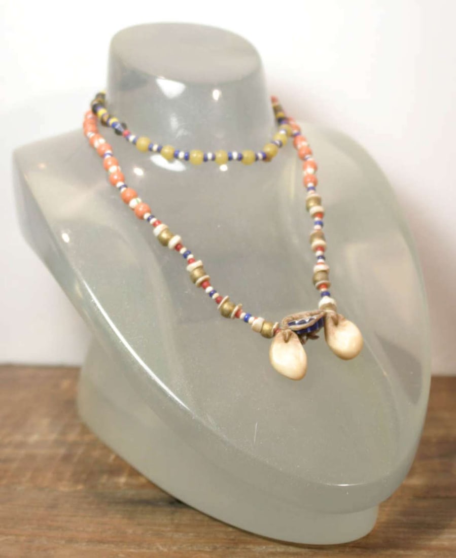 vintage estate jewelry: Native American necklace: vintage or antique hand knotted Indian or Native American necklace, made up of red, white and blue seed beads and bone chips with gold, pink and green glass trade beads and 2 real te