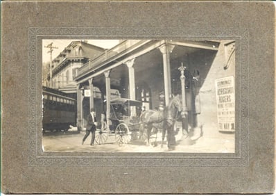 1894 cabinet photo showing the world's FIRST movie poster