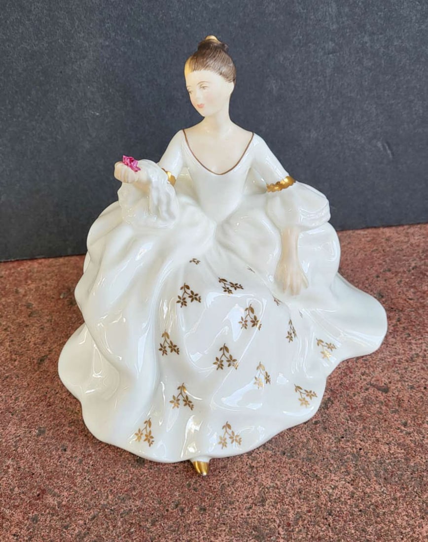 vintage Royal Doulton lady figurine: marked as shown underneath Doulton and Co My Love H.N. 2339 1965, depicting a woman in a flowing white dress with gold or gilt floral design holding a pink flower (Rose?)