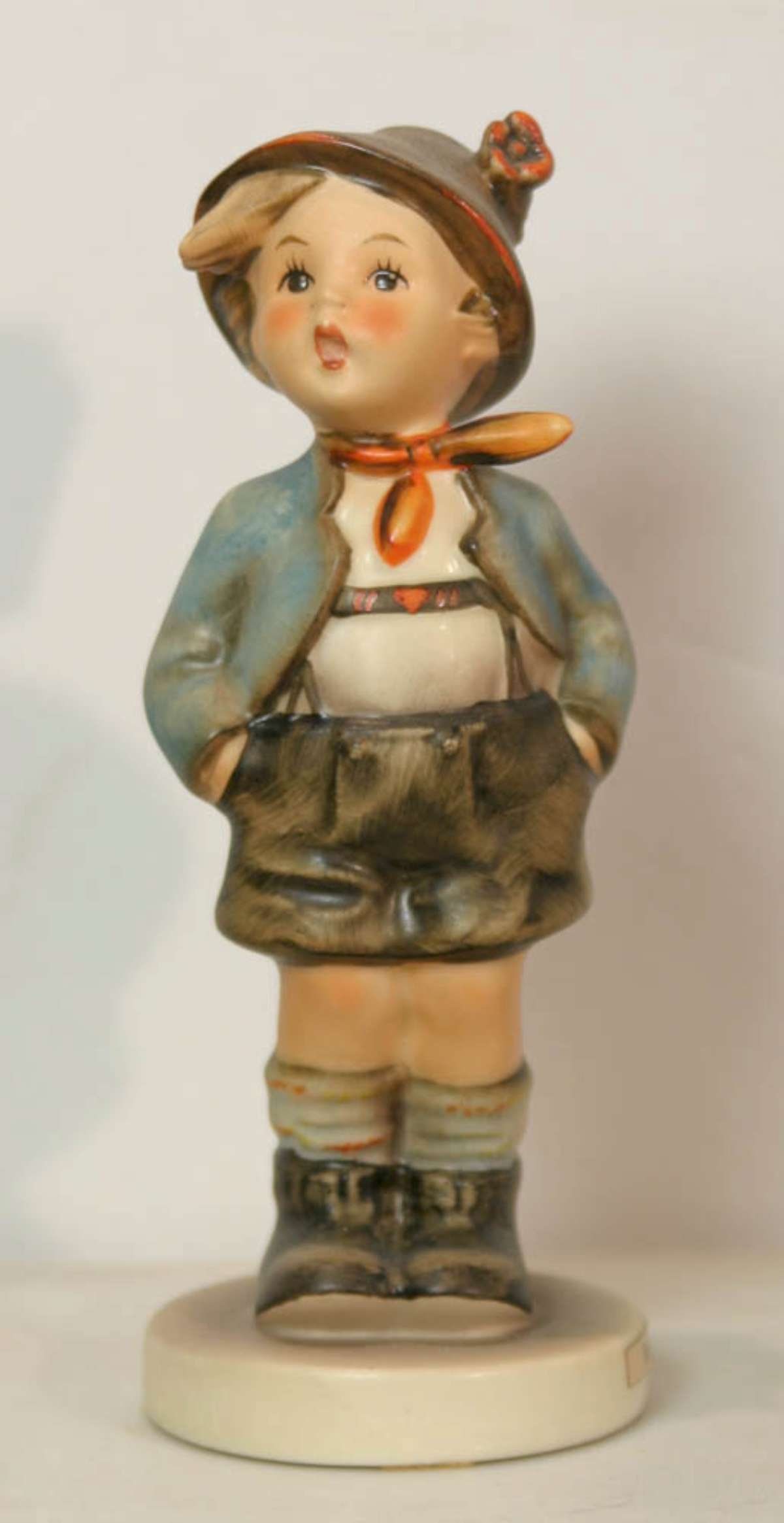 vintage Goebel Hummel figurine: shaped like a boy with a cap and named Brother, marked as shown Goebel W. Germany and bee in Vabout 5 1/2" tall