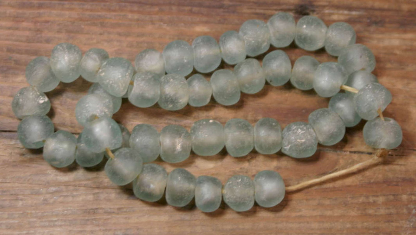 vintage estate jewelry: African necklace: hand strung necklace with African light blueish green sea glass beads (heavy!)