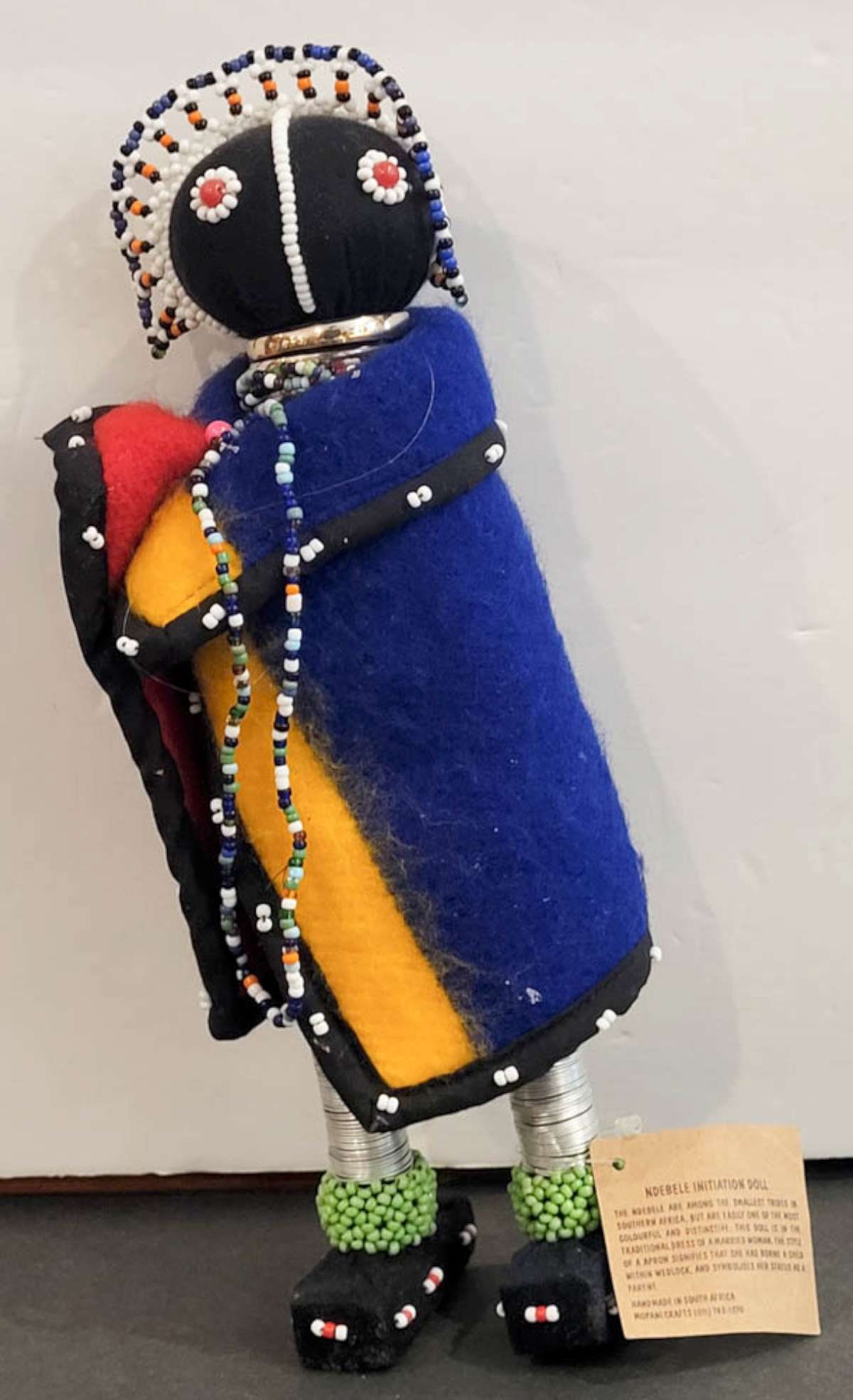 vintage Ndebele African ethnic cloth doll: South African Ndebele vintage cloth or felted wood doll with metal wire and seed bead decoration, ceremonial or initiation doll, with original paper tag about 11" tall