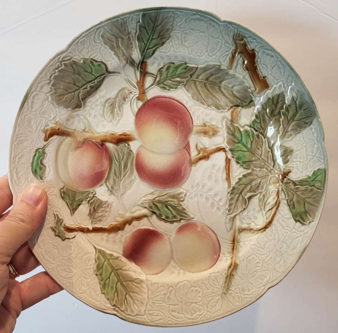 antique French Majolica fruit plate: antique porcelain plate with raised or embossed apple or peach tree design, by Keller and Guerin St. Clement, marked Made in France see the next lot for a matching plate by the same maker