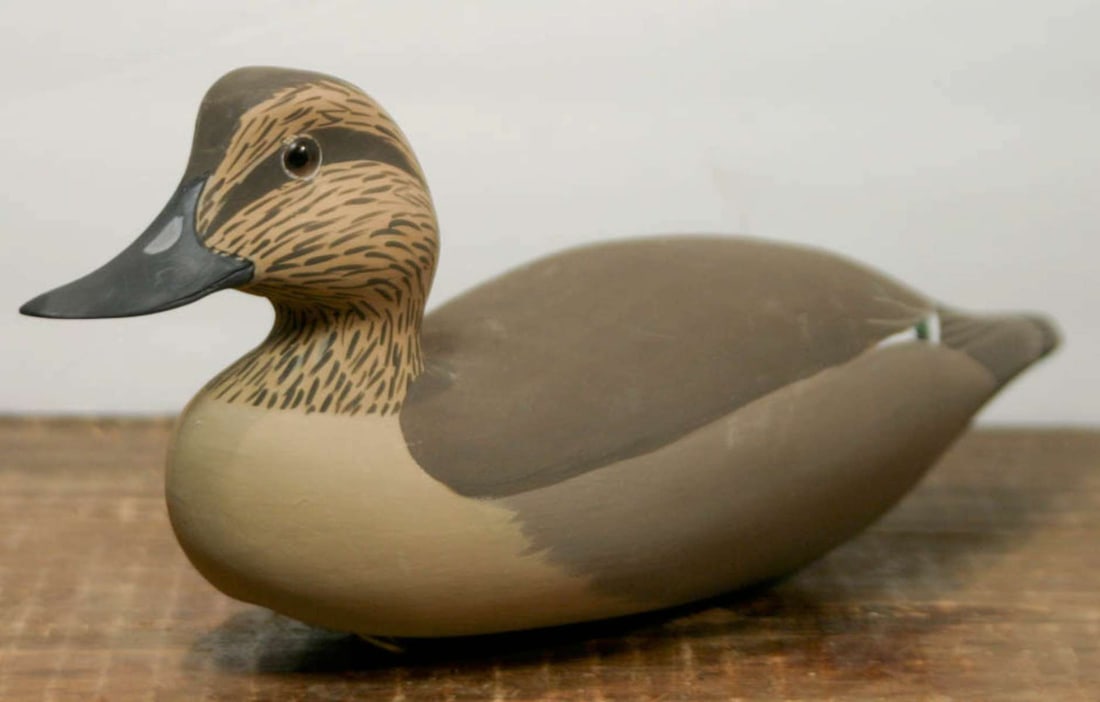 vintage carved wooden bird sculpture, marked: vintage Folk Art carved wooden waterfowl bird (female Duck) decoy in brown and beige tones with glass eyes and bright green feather accent, hand painted and marked as shown underneath what looks