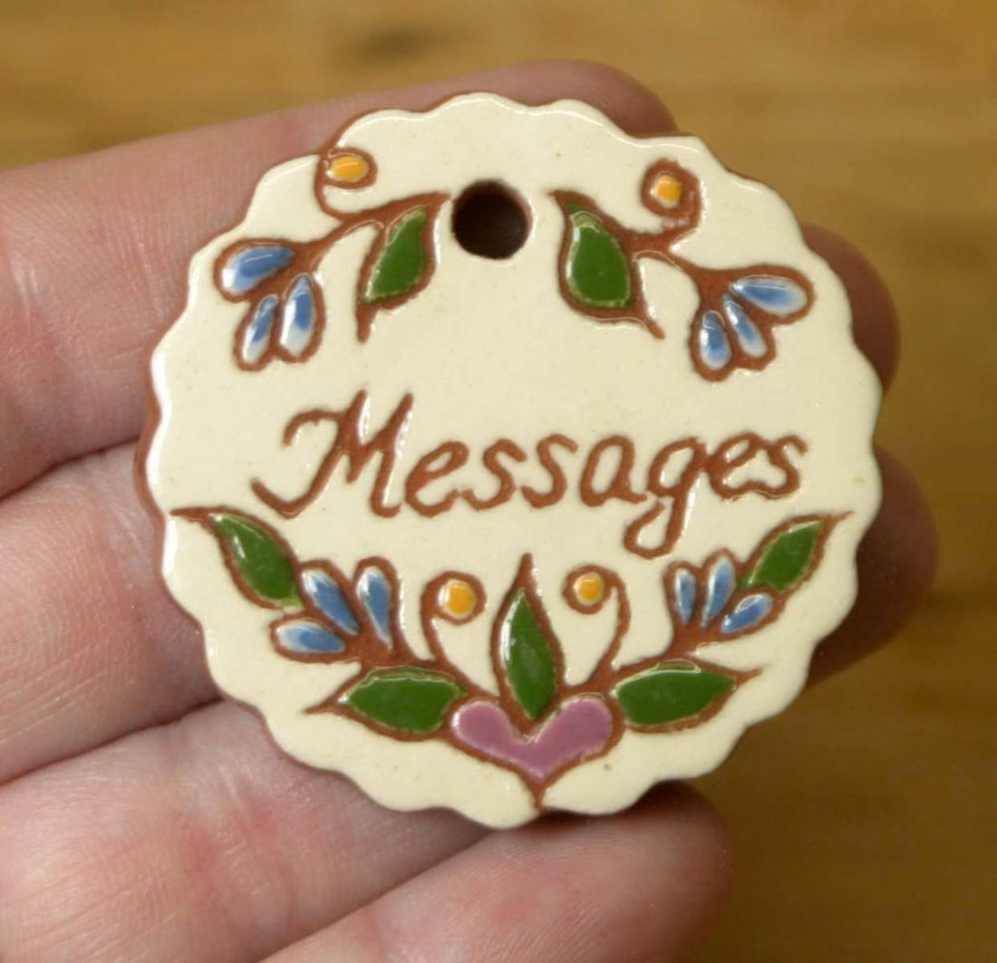 vintage redware Christmas tree ornament: vintage Folk Art polychrome glossy glazed round scalloped redware ornament marked Messages and signed as shown C. Wert