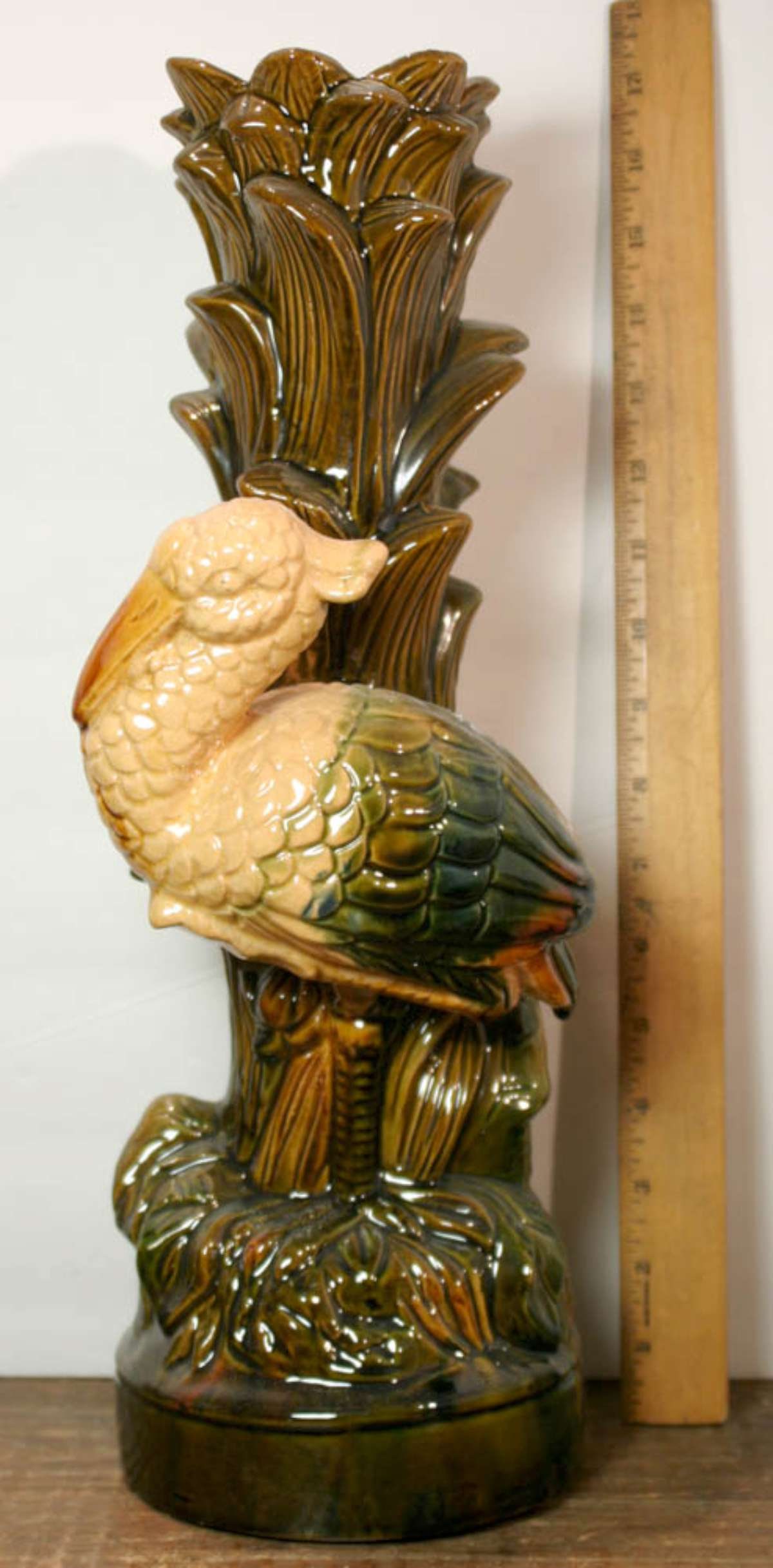 vintage Majolica bird candle holder: tall vintage (or antique?) Majolica pottery Stork candlestick in high gloss glaze with the bird standing in front of a reed of tall leaves, looks like the Frederick Cooper table lamp, but