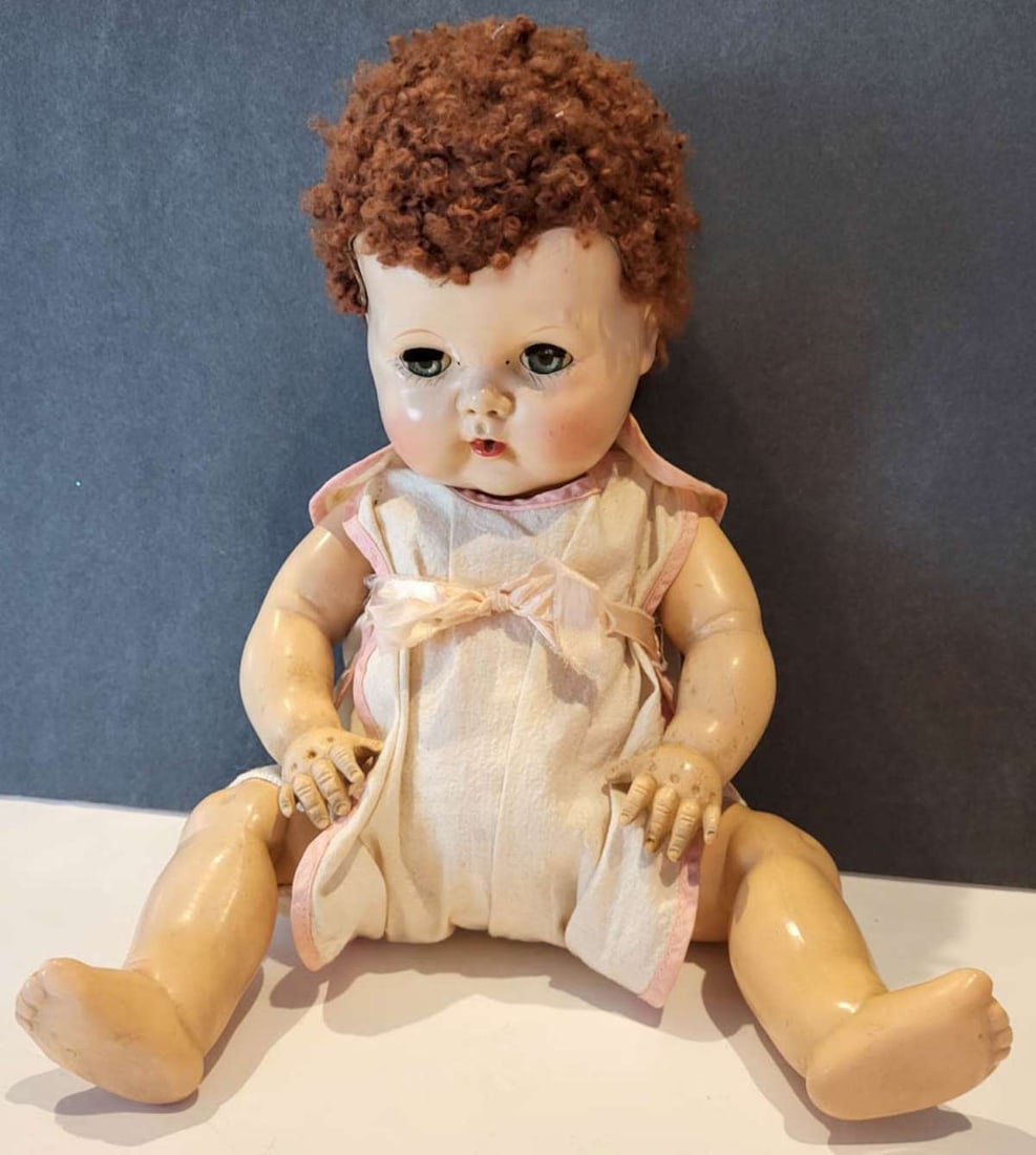 vintage Ideal Tiny Tears girl doll: ca. 1950's rubber or soft plastic Ideal Character doll with curly hair, sleepy eyes and what appears to be the original outfit