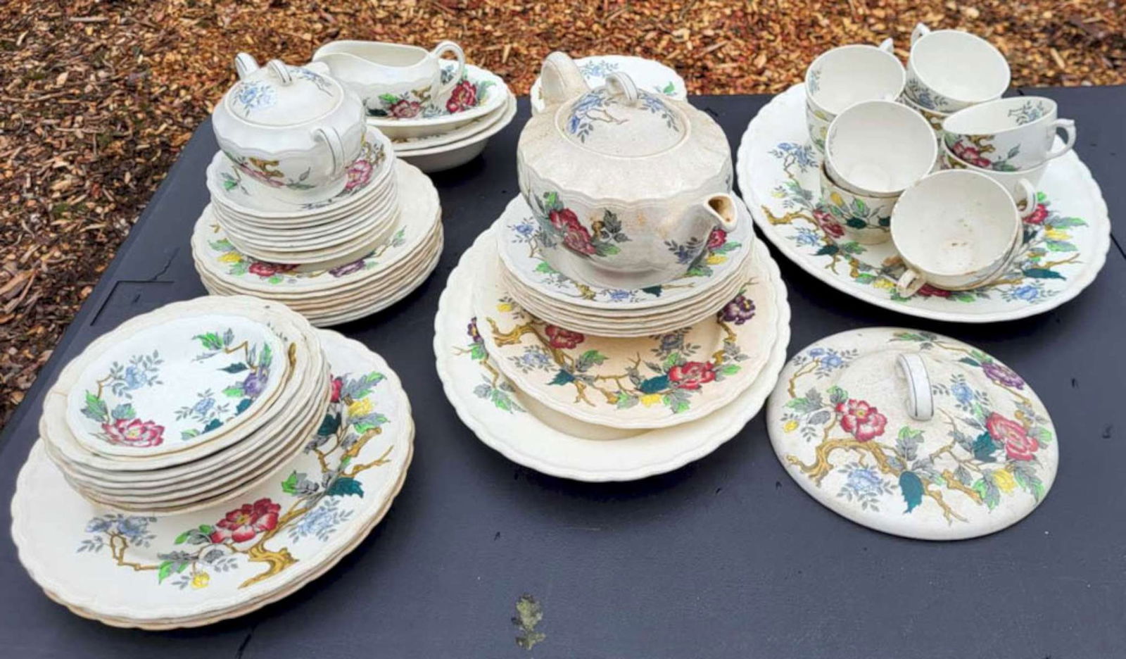 antique dinnerware set by Wood and Sons: antique set of dishes by Wood and Sons, pattern "Ashbourne", made in Burslem England, beautiful and brightly colored floral and leaf design, includes mostly plates in