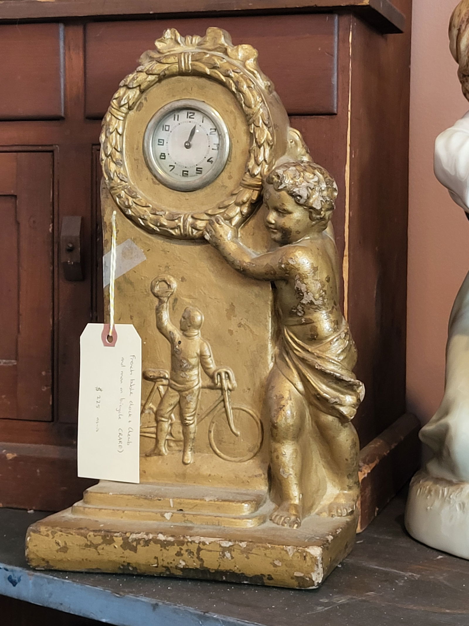 antique gilt mantle clock with cherub and bicycle (1 of 8)