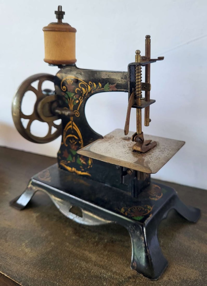 miniature antique German toy sewing machine (1 of 9)