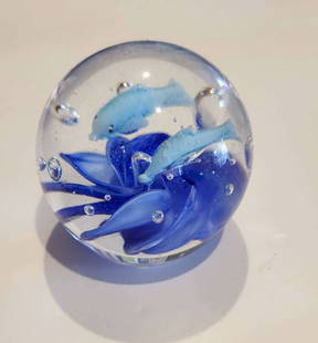 vintage glass paperweight with fish design: vintage round clear paperweight with blue waves and pair of dolphins and bubbles&comma; with original paper sticker for Dynasty Gallery Heirloom Collection
