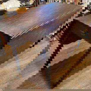 antique carved wooden dining table with leaves: antique mahogany stained wooden dining room table with two drop-down (or flip-up) leaves and two fake drawers with pulls&comma; sturdy carved legs complete the look&comma; ca. 188039&quot; long by 22