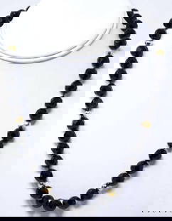 vintage estate jewelry: Jet necklace: Art Deco Flapper period&comma; unmarked (but likely French) black faceted Jet glass beads with gold toned spacers and marked 14K gold filled clasp closureabout 19 1/2&quot; long