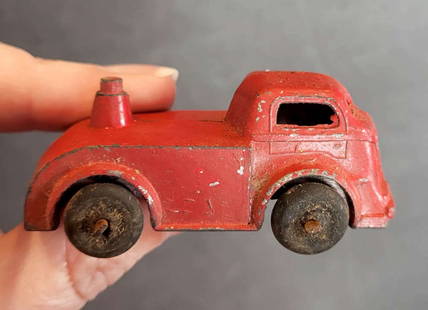 vintage Barclay red toy car: ca. 1930&apos;s original red painted toy truck or car by Barclay&comma; marked Made in USA as shown and with the original wheels