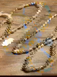 vintage estate jewelry: African necklace: very long and heavy vintage or antique African tribal trade bead necklace with Venetian pottery beads in vibrant colors of blue, mustard yellow and green and hand knotted with rope ends
