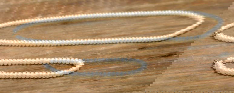 vintage estate jewelry: pearl necklace suite: matching set of a bracelet and necklace&comma; each with 10k gold clasp closure (not sure if the symbol next to the karat is a maker&apos;s mark or GFE mark)&comma; with small baroque donut shaped fre