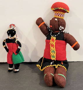 pair vintage Zulu African ethnic cloth dolls: set or lot of two vintage cloth or felted wool dolls with seed bead accents&comma; representing the Zulu people who mainly live in the province of KwaZulu-Natal in South Africa&comma; the hat is calle