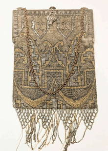 Art Deco period handbag or purse: vintage or antique, ca. 1920's micro-beaded bag with a chain holder, clipped closure with abstract floral or flower knob and fringe on the bottom, original label Made in France