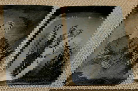 pair antique tintype photographs: set or lot of two ca. 1890&apos;s tintype photographs&comma; both black and white and the first of a lady in black lace and with hand tinted cheeks and the other what appears to be a family portrait o