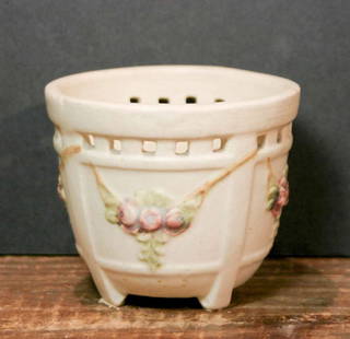 antique Weller small planter pot: marked Weller as shown&comma; this is a small cream colored pottery footed pot with a pierced edge and wreath or garland design with roses or other flowers and leavesabout 3 7/8&quot; tall and 4 1/2&q