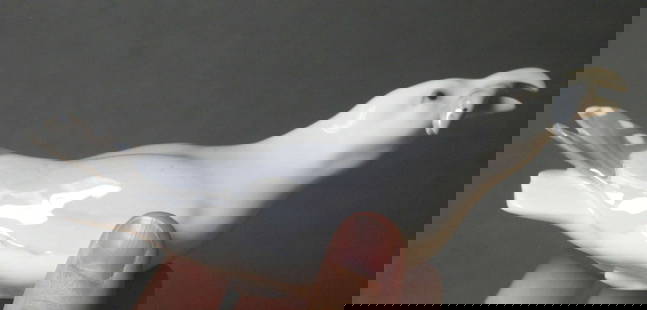 vintage Danish porcelain figural bird: Danish porcelain statue shaped like a Seagull with a fish in his beak and marked as shown Made in Denmark B and G (Bing and Grondahl) and numbered 1808 and with artist's marks