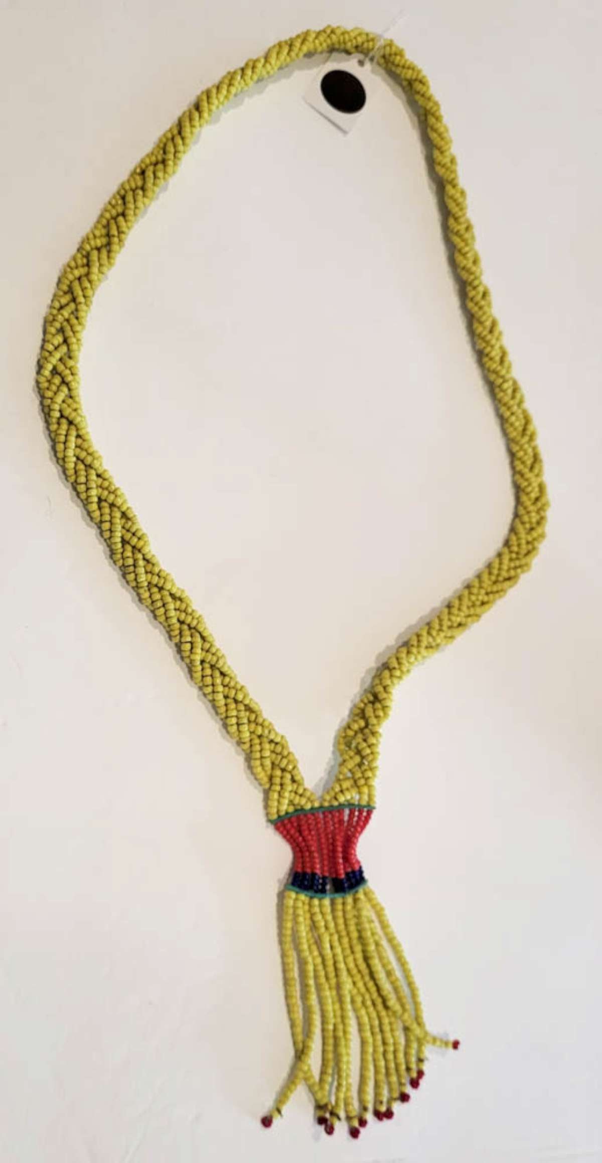 vintage estate jewelry: African necklace: vintage, ethnic (likely African) trade bead necklace with braided yellow microbeads in a twisted design and a dangly fringe in blue and redabout 27" long (not including the tassel drop)