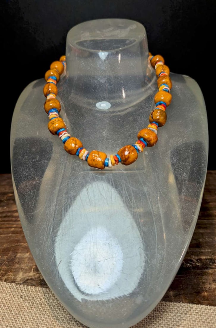 vintage estate jewelry: glass necklace: unusual fat or chunky glass beaded necklace with mustard yellow tones and vibrantly colored chip spacers also made of glass, twist closureaprox. 16" in length