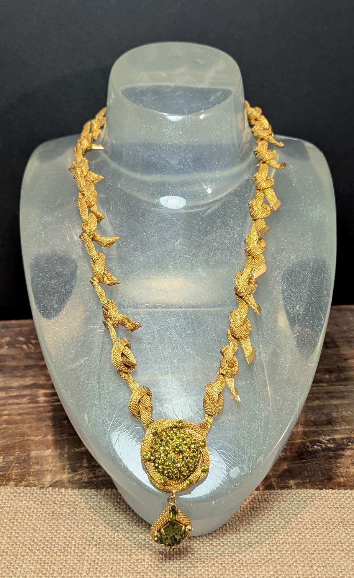 vintage estate jewelry: mesh necklace with green stones: unusual ca. 1950's or 1960's MCM or Mid century Modern braided or knotted gold toned (possibly plated?) metal mesh necklace with faceted cut green stones as shown, no maker's mark
