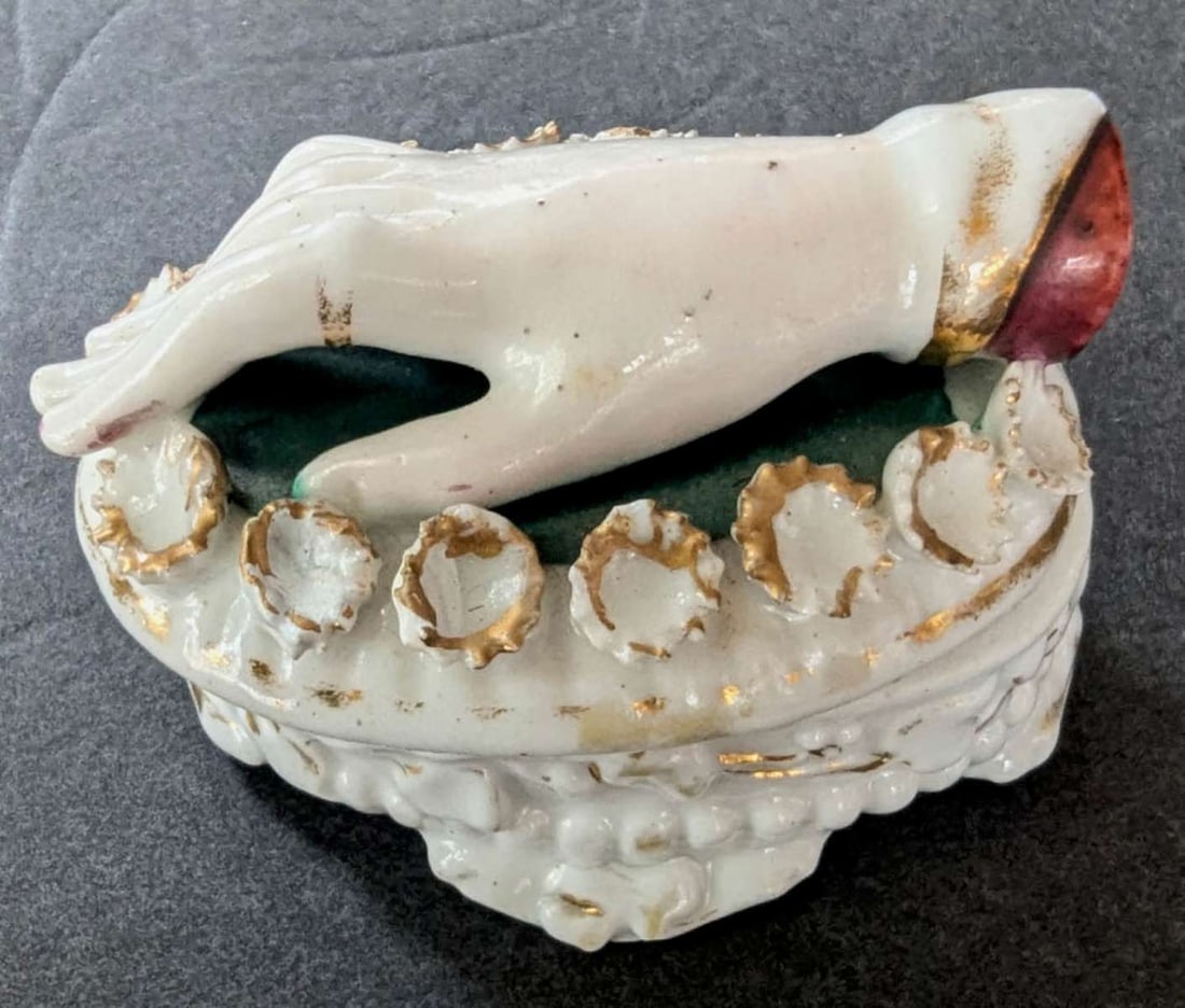 antique porcelain fairing box with hand (1 of 11)