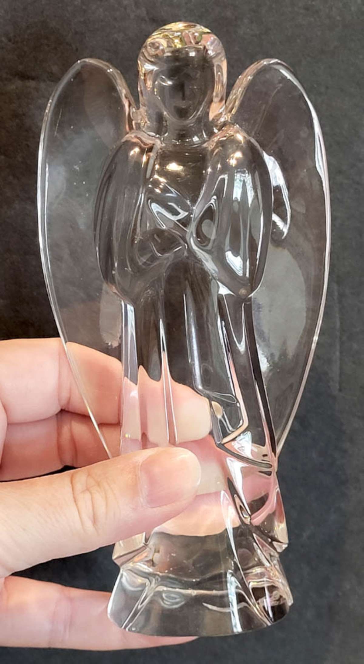 vintage figural glass paperweight by Baccarat: vintage clear glass paperweight shaped like a praying Angel with long robes and wings and marked underneath Baccarat as shown