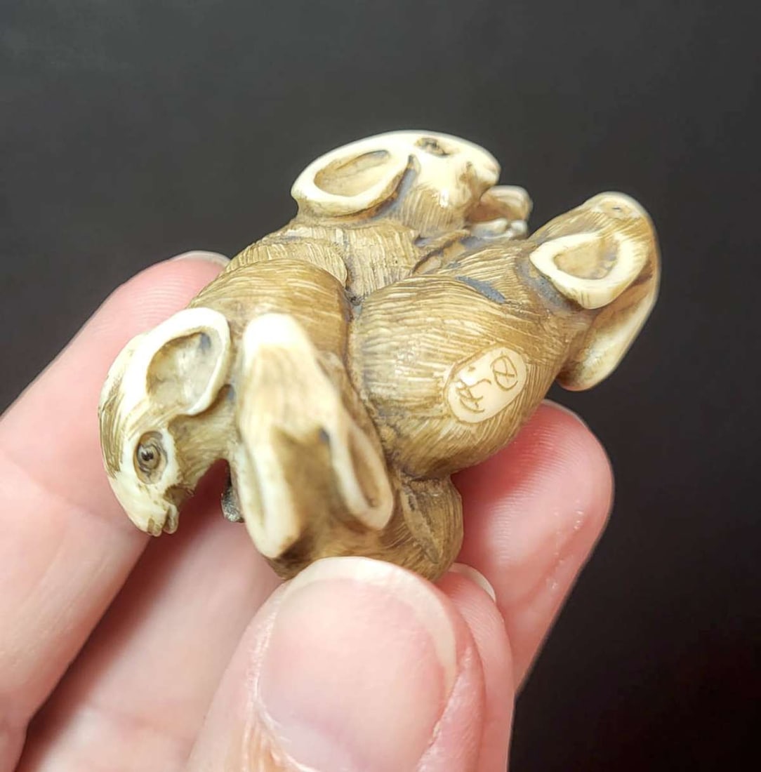 antique carved bone Asian figural netsuke: vintage or possibly antique carved bone amulet or charm netsuke shaped like bundle of 5 writhing or huddling rats or mice, with carved darker "fur" design and signed with a Japanese ch