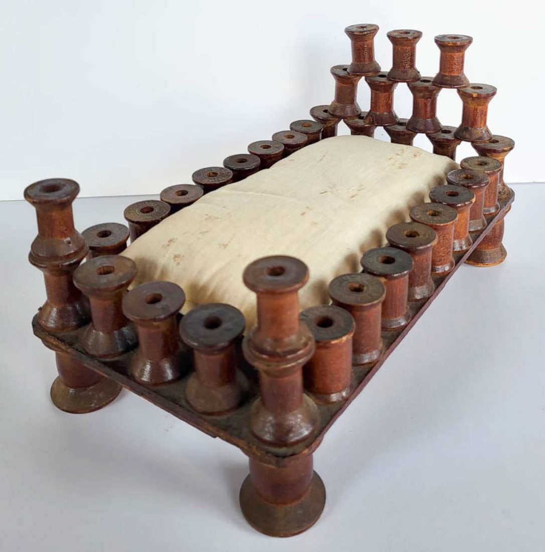antique spool Folk Art doll bed: antique Primitive wooden spool bench made bed, with home made fabric "mattress"