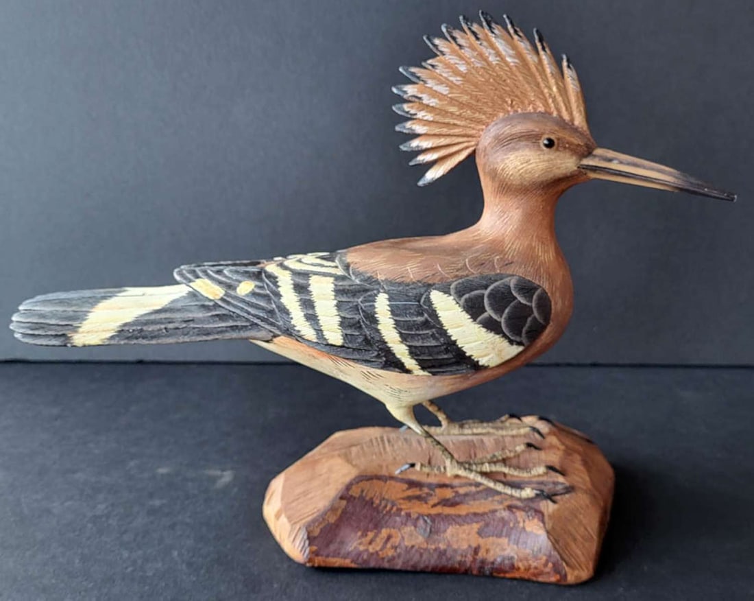 vintage carved wooden bird sculpture: vintage carved wooden bird sculpture signed by the artist on the bottom in a language I cannot make out, of a beautifully made brown, black and white Hoopoe bird with wire legs and on a pi