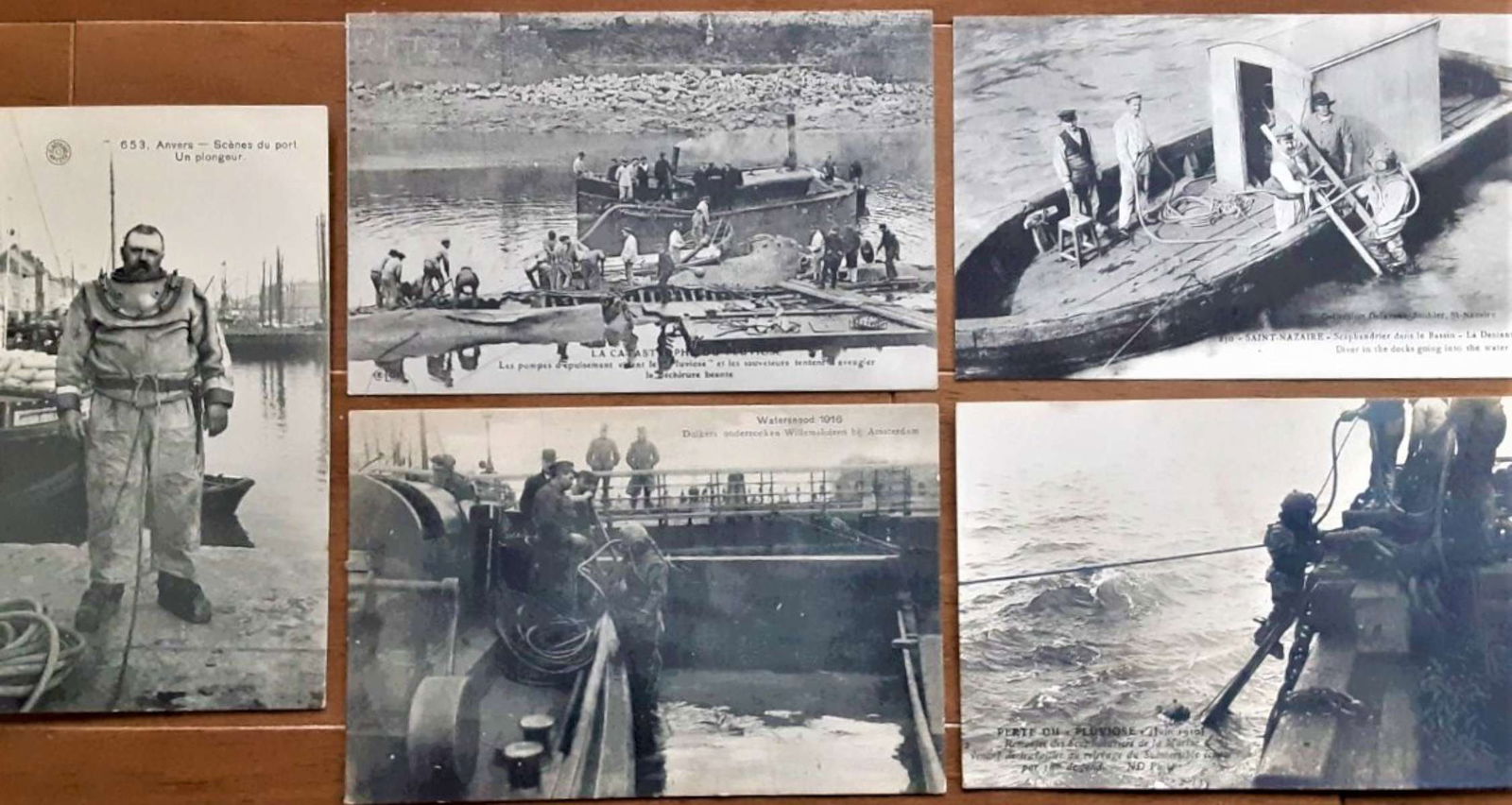 set of 5 antique deep sea diver postcards: This is a set of five rare antique photo postcards featuring hardhat deep sea divers in action. The card shown in the third scan is a real photo postcard or rppc dated June, 1910, while th