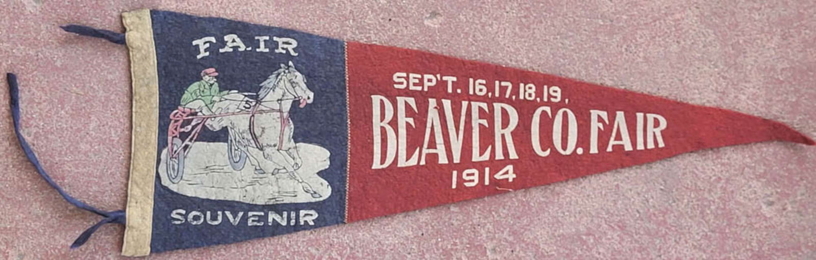 antique Pennsylvania 1914 fair pennant: antique felted wool flag or pennant with dark blue and dark Maroon red and Fair Souvenir September 16, 17, 18, 19 Beaver County 1914 and with depiction of a jockey with his horse and