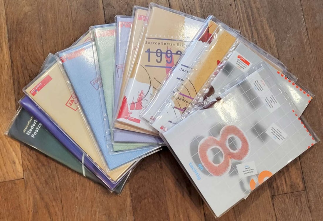 lot of 12 vintage European stamp books: Dutch (from Holland or The Netherlands) stamp collecting books, partially filled in with 1980's and 1990's stamps (see close-up pictures for examples)