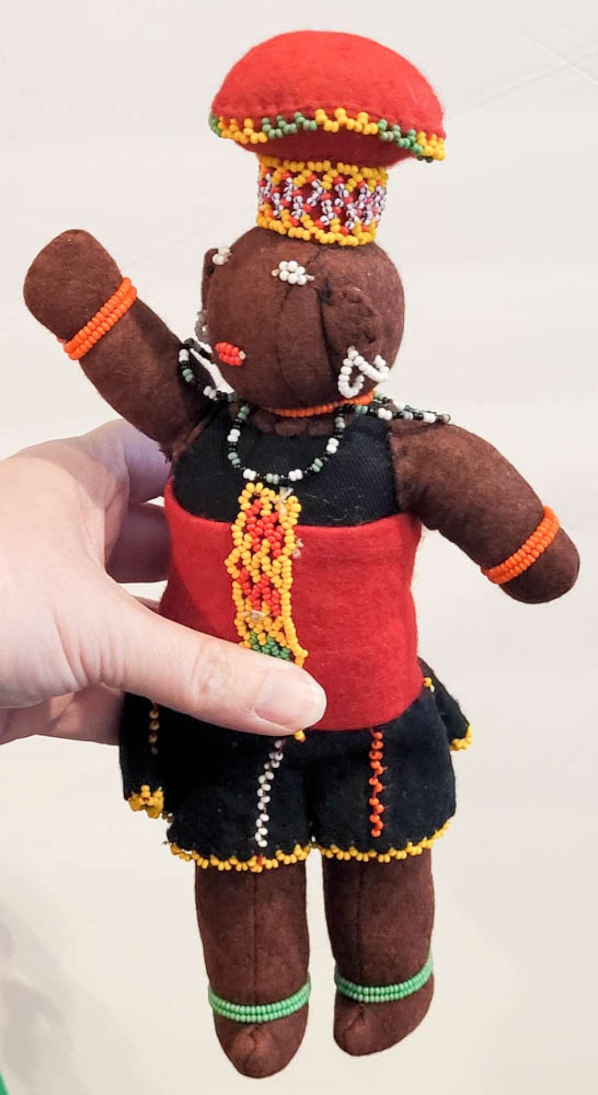 vintage Zulu African ethnic cloth doll: vintage cloth or felted wool doll with seed bead accents, representing the Zulu people who mainly live in the province of KwaZulu-Natal in South Africa, the hat is called Isicholo and is